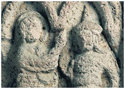 German Jewish hat of
                        Nikodemus (right) with Jesus (left) on the
                        baptismal font of Lippoldsberg (Lippoldsberger
                        Taufstein) in the Lippoldsberg abbey church,
                        13th century