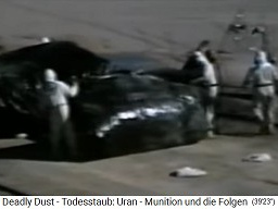 After the
                            Iraq war, the uranium tanks are packed and
                            NATO personnel is walking around in
                            protective suits 2
