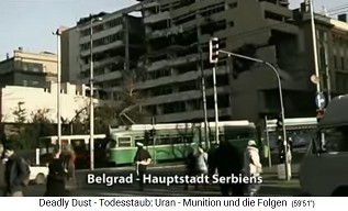 enter of
                            Belgrade, tram is passing an open,
                            radioactive (!) nuclear ruin - a building
                            bombed by NATO with nuclear missiles
                            (uranium ammunition)