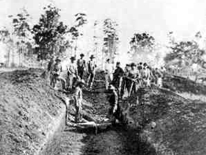 Mass grave in
                                                    Andersonville
                                                    1864-1865