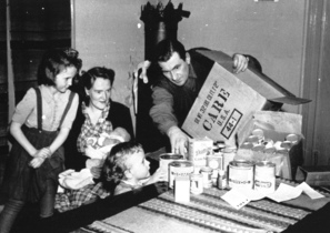 Post-war era in remaining
                                        Germany, Care parcel with tins