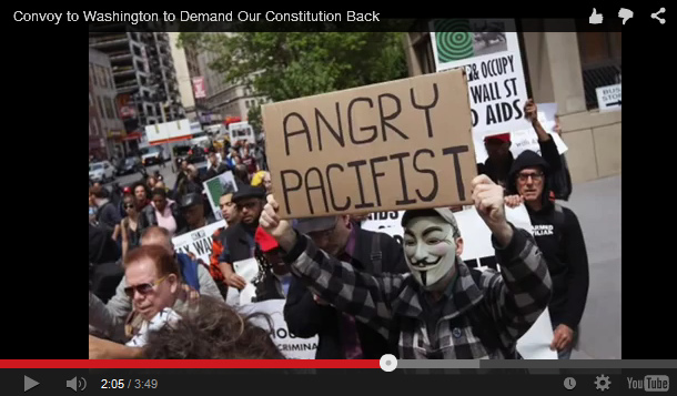 Demonstration mit dem Schild                                  gegen Obama "Angry                                  Pacifist"