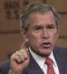 George W. Bush with upraised forefinger. He
                        expels the whole Bin Laden family instead to
                        query them...