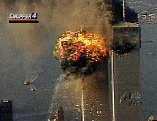 The
                        official impact in the South Tower seen from the
                        helicopter according to the TV film: In the hole
                        in the first tower sticks no airplane.