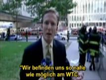 Reporter (N.J. Burkett from Fox5 News) in
                        front of the WTC before the collaps of the South
                        Tower