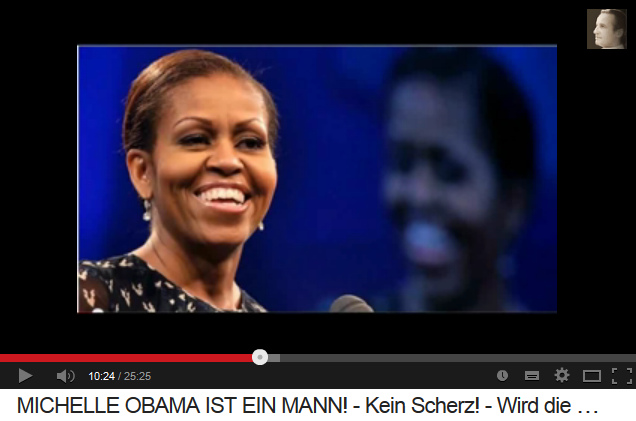 Michael Obama disguised
                        as a "First Lady" with broad masculine
                        shoulders, with strong masculine neck muscles,
                        with broad, masculine forthcoming chinn, with
                        male form of his front, with painted eyebrows,
                        and with earrings diverting the public