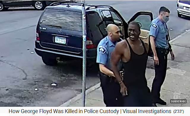 Floyd near his car WITHOUT handcuffs