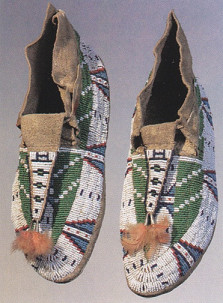 Moccasins of Cheyenne primary nation with
                          beading technique