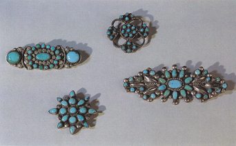 Brooches with turquoise gemstones of
                            Zui primary nation