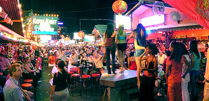 Public bar street in Phuket,
              Thailand, for a "happy night" for tourists