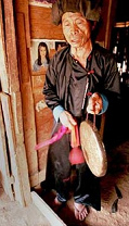 Laos, Meo (Hmong) shaman with drum