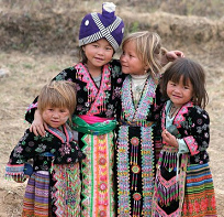 Meo (Hmong) children with black and blond
                        hair