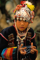 Thailand, Akha girl with
                                    thread game