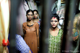 Brothels in Mumbai are organized putting
                        girls into brothel cages so they will serve men
                        at the end