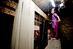 Nepal, Kathmandu, girl in carpet factory