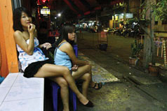 Sungai Kolok, Thai
                        brothel "Summertime bar" at
                        Thai-Malaysian border with Thai prostitutes
                        waiting for men from Malaysia