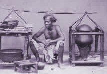 Street peddler in Batavia selling soup, about
                  1870. Indonesia