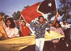 East Timor: demonstration with flag of East
                    Timor