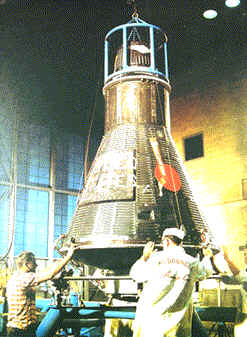 The one man atmosphere capsule
                      "Mercury" in a production hall.