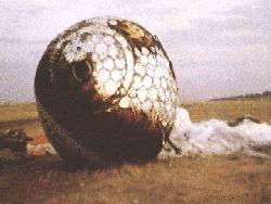 Gagarin's alleged landing capsule on a
                        meadow, laterally reversed