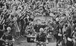 Gagarin in Prague: People waving Czech
                            little flags.