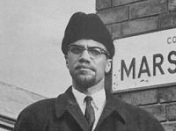 Brgerrechtler Malcolm X mit Mtze.