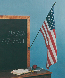 The
                          eternal nationalism in the "USA"
                          with national flags ("school flags")
                          beside the black board.