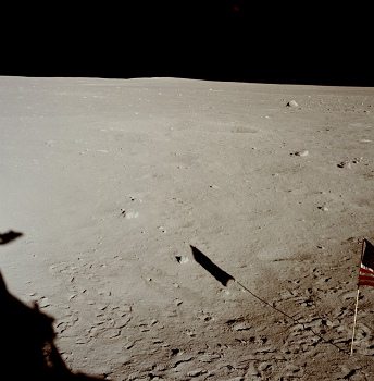Apollo 11 photo no. AS11-37-5479: the
                        shadow of the flag
