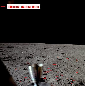 Apollo 11 photo no. AS11-37-5449. According
                        to NASA this photo shows the "lunar
                        surface" after the landing of Apollo 11 by
                        the window of Neil Armstrong. In the foreground
                        one can see a thruster. The shadows are
                        non-uniform and by this impossible.