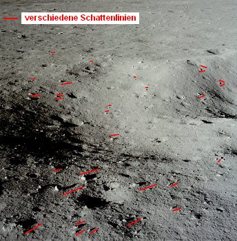 Apollo 11 Foto-Nr. AS11-37-5459: Jetzt
                        behauptet die NASA, die Kamera sei von Edwin
                        Aldrin an Neil Armstrong bergeben worden, und
                        Neil habe noch einmal ein Kraterfoto von seinem
                        Fenster aus gemacht. Das Schattenchaos am Krater
                        weist wiederum auf Fotomontage und
                        eingezeichnete Schatten hin...