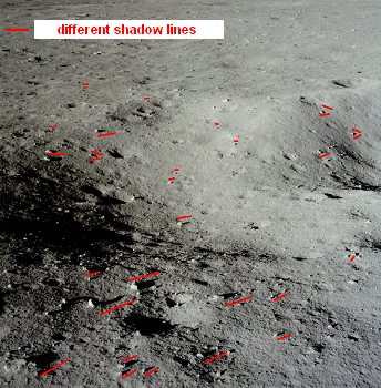 Apollo 11 photo no. AS11-37-5459: Now NASA
                        claims that Edwin Aldrin gave the camera to Neil
                        Armstrong and Neil had taken another photo of
                        the crater by his window. The chaos of shadows
                        on the crater is the same as in the beginning,
                        and this indicates the photo composition with
                        drawn shadows...