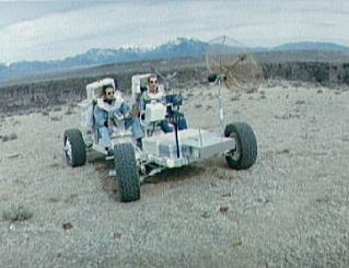 Training for Apollo 15 foto no.
                          S71-23774: Irwin and Scott in the training
                          "moon car" "Grover" during
                          an EVA excursion in a landscape similar to the
                          moon at Taos al Rio Grande (New Mexico),
                          11.-12. March 1971, catalogue date 3.11.1971