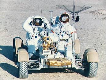 Training of Apollo 15, foto no.
                          S71-39867: Scott and Irwin seat in the
                          "moon car" during a simulation
                          training with a "moon surface" at
                          Kennedy Space Center (KSC), katalogue date 30.
                          June 1971.