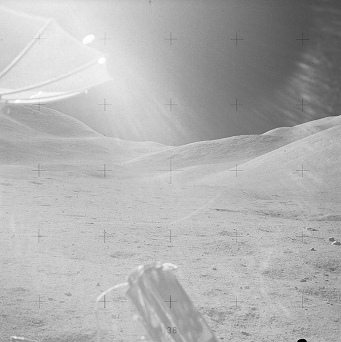 Faked moon landing Apollo 15 photo no.
                        AS15-85-11472: Sun show effect with moon
                        antenna