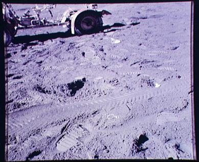 Faked moon landing Apollo 15 photo no.
                        AS15-88-11874. NASA presents the photo with the
                        "moon car" in a distorted way, the
                        wheels are not round.