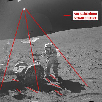 Apollo 16 Foto-Nr. AS16-106-17730:
                        "Mondauto" in Steinwste,
                        Schattenchaos und zwei Sonnen.