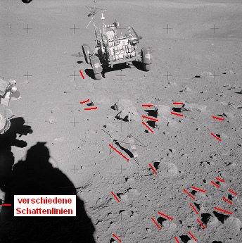 Apollo 16 Foto-Nr. AS16-109-17948: Station
                        4, das "Mondauto" steht in der
                        Steinwste, Schattenchaos