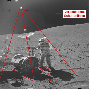 Apollo 16 Foto-Nr. AS16-106-17730:
                        "Mondauto" in Steinwüste,
                        Schattenchaos und zwei Sonnen.