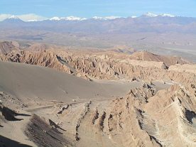 "Moon landscapes" in Chile:
                        Atacama desert 07: mountain range and volcano
                        panorama