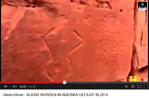 Zuni-Petroglyph mit einem Wesen
              in rautenartiger Form, der Kopf scheint abgeplatzt