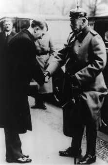 Hindenburg
              handing over the power to Hitler on 30 January 1933,
              Garrison church, Berlin