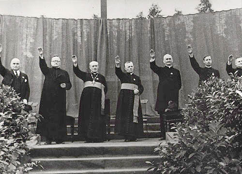 August
                1933: Priests making Hitler salute for Hitler in Berlin
                in New Cologne stadium (German: Neuklln)