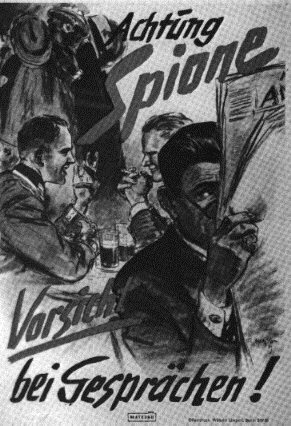 Propaganda poster
                                        "Take care of spies - take
                                        care during talks" (German:
                                        "Achtung Spione - Vorsicht
                                        bei Gesprächen") in 1939
                                        apr.