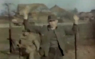 German soldier is taken with risen hands