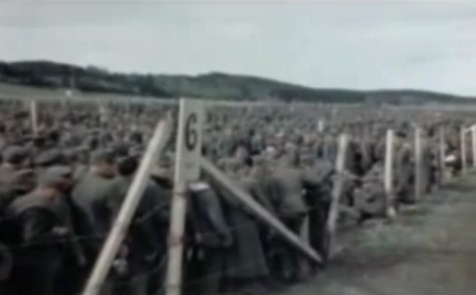 German soldiers are hold like animals in a Rhine
                  meadow camps behind barbed wire, sector 6