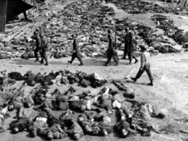 "American" soldiers with round
                        "American" helmets and with rows of
                        German bodies in a Rhine meadow camp