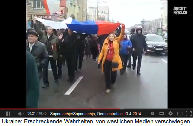 Demonstration in Saporoschje, 13.4.2014, hier
                    mit grosser, russischer Fahne