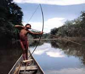 Native hunting fishes with
                    arch and bow