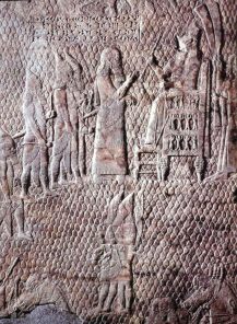 Lachish: Sennacherib receiving the
                        surrendered Jewish ruler, relief