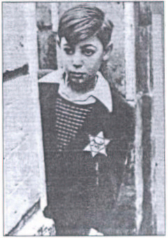 France, boy with bright Jewish star with
                          inscription "Juif"
                          ("Jew")